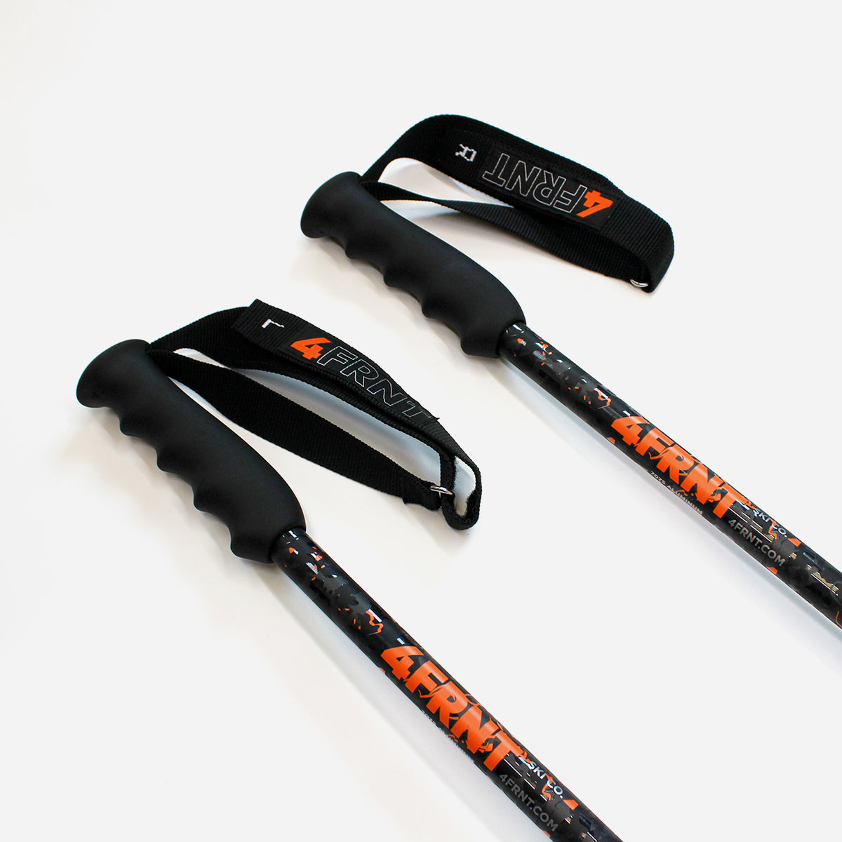 a detail shot of the grips on the 2024 fixed poles with an orange 4FRNT logo