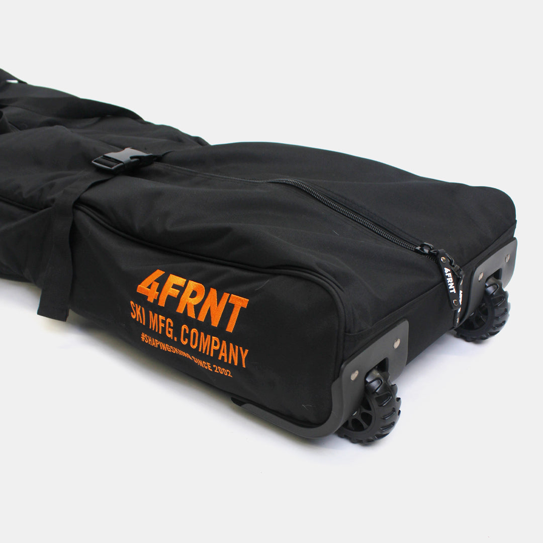 4frnt skis black and orange double ski roller bag close up of wheels